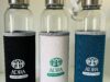 Garrafa em vidro, bolsa em Soft Shell, 520 ml.
